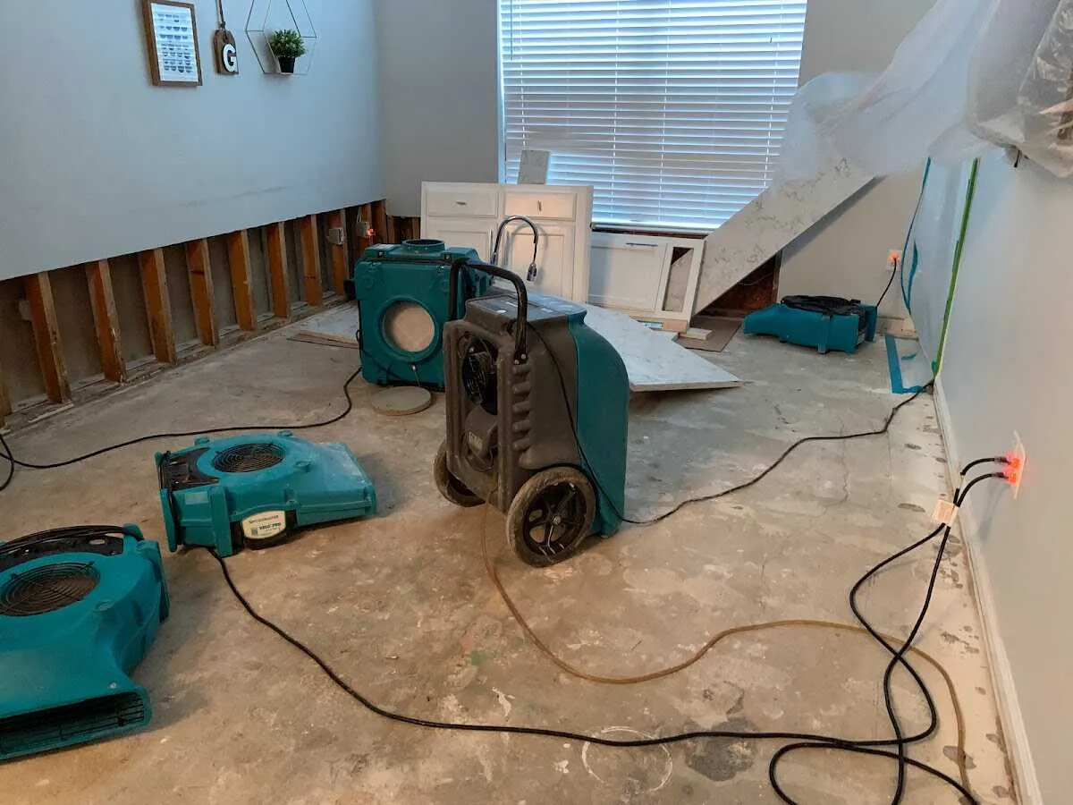 Dehumidifier in flood-cut room for Water Damage Restoration in Elko